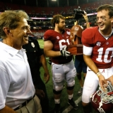 Nick Saban caught smiling in an unguarded moment