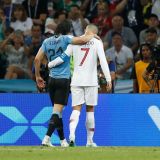 Uruguay Minds Its Manners, Sees Off Portugal