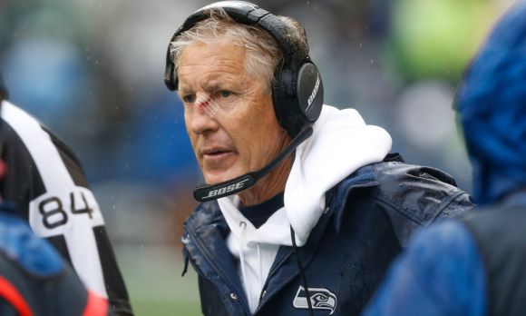 Pete Carroll Brutalized by Stray Football during Pre-Game Warmups