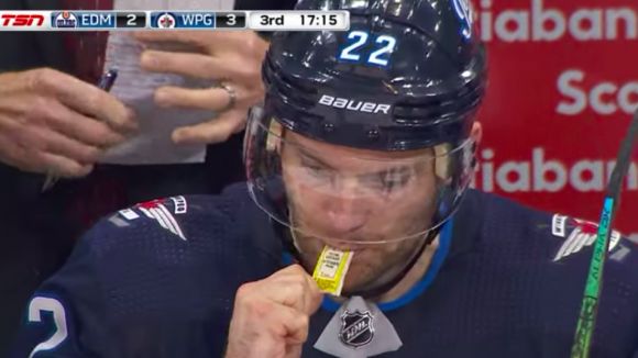 This Winnipeg Jet Was Sucking Mustard  on the Bench during a Game