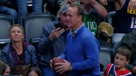 Peyton Manning Yuks It Up with Rocky at a Nuggets Game