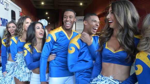Those Socially Conscious Rams Cheerleaders Stage an Impromptu Sit-In During a Game