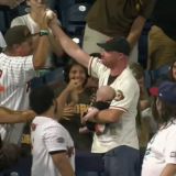 Let's Watch This Giants Fan Catch a Homer while Juggling a Baby