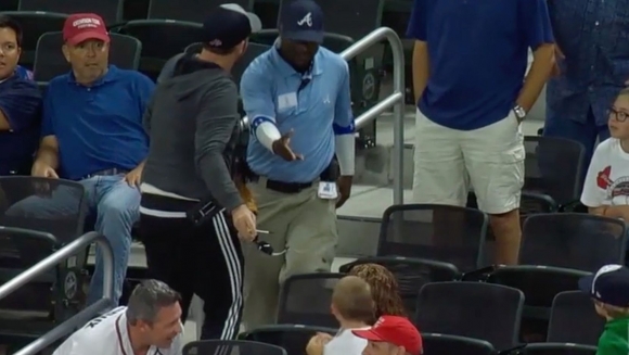 Braves Security Guard Attempts to Make a Child Cry