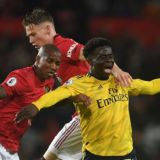 Man Utd and Arsenal Share Points at Rainy Old Trafford