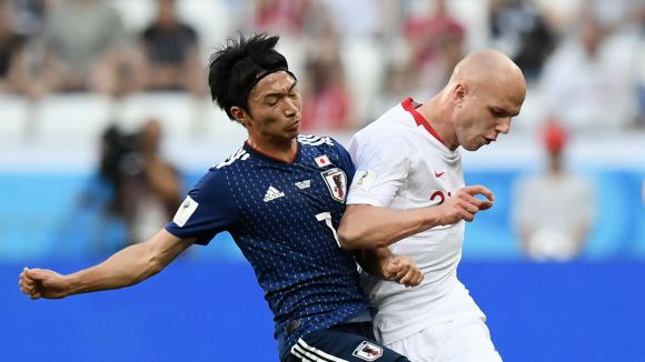 Japan Backs into Round of 16 by Losing Politely