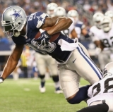 Rare photo of Dallas receiver still holding onto the ball.