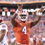 Tigers Cruise by Sooners to CFP Title Showdown