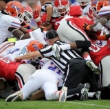Louisville Crashes; BCS Churns