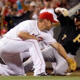 Pirates and Reds Battle for Home Turf