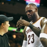 LeBron James Enjoys an Adult Beverage Courtside