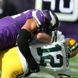 Packer Whacker Barr Ends Rodgers' Season; Leaves Later with Concussion
