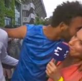 Player Kisses Reporter at French Open During Live Interview